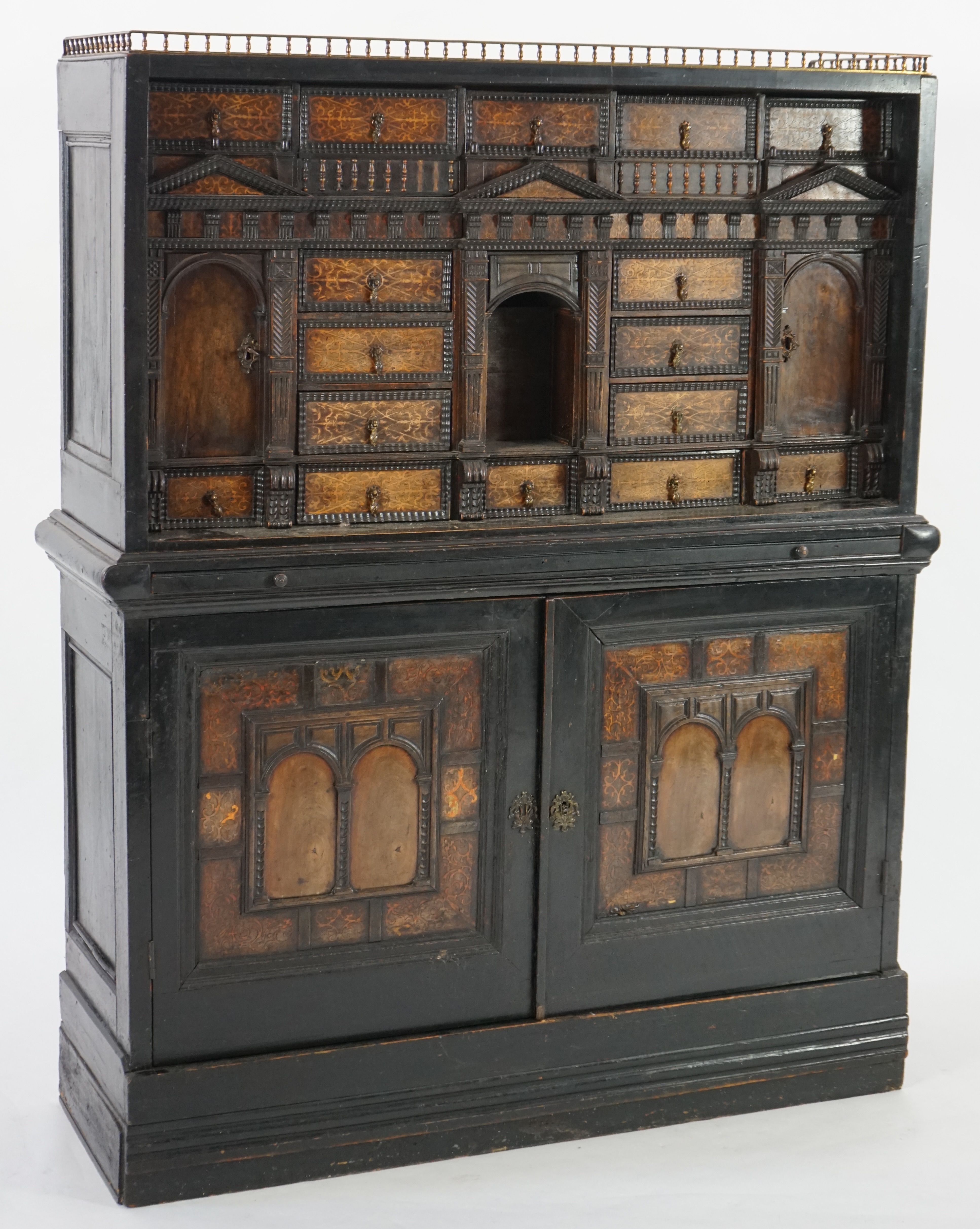 An 18th century and later Dutch walnut ebonised and marquetry inlaid collector's cabinet on stand
